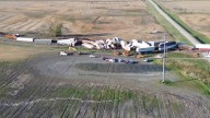 Train derails, driver killed after combine-train collision in rural North Dakota