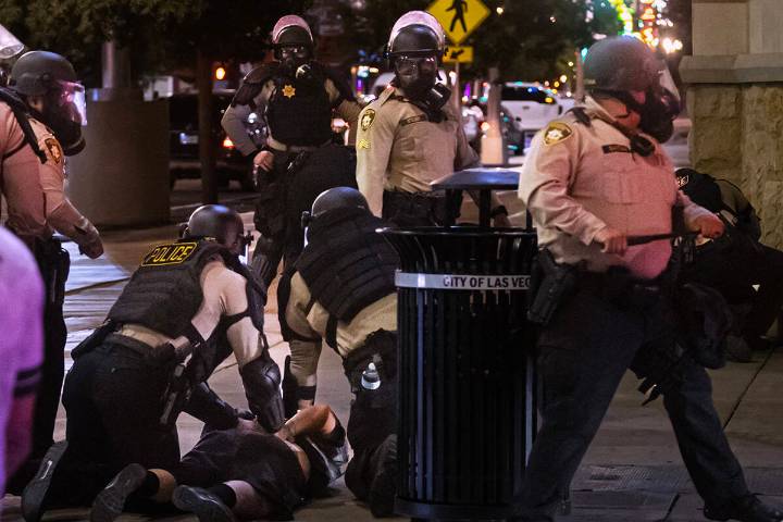Las Vegas police shot protester who criticized them with pepper balls, suit says