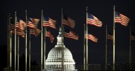 Uncertainty follows shutdown; Dodgers begin title defense
