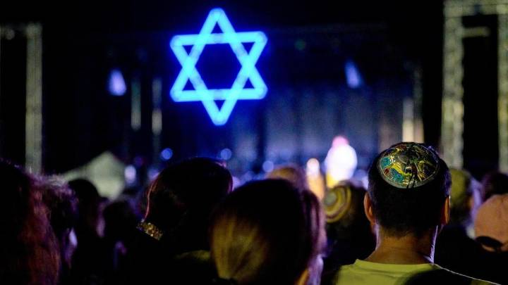 Vigils mark Israel attack anniversary, Gaza death toll