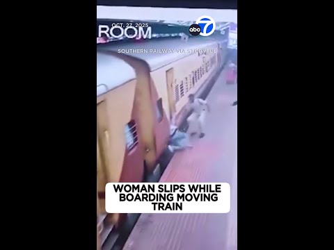 Woman slips while boarding moving train