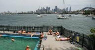Men swept from pier dead, extreme heat to smash records
