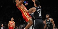 Jalen Johnson and Hawks hold off winless Nets 117-112 after Trae Young exits with knee injury
