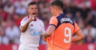 Barcelona loses 4-1 at Sevilla as Lewandowski misses penalty
