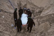 Palestinian militants hand over 2 sets of remains of hostages to Red Cross in Gaza