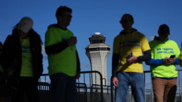 Isolated flight delays may spread as air traffic controllers go without pay during shutdown