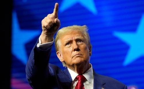 Trump threatens Canada with 10% extra import tax for not pulling...
