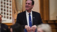 What is Larry Rhoden's approval rating?