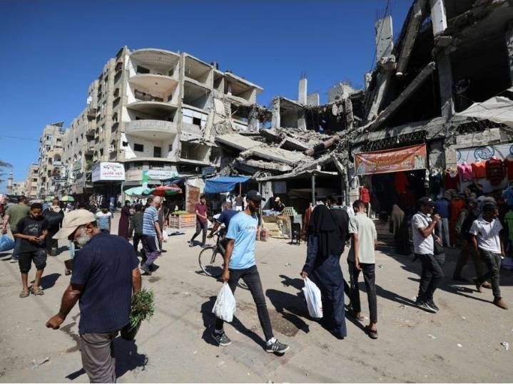 Gazans return to razed homes