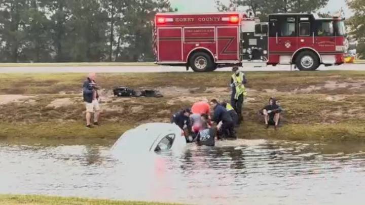 Video shows dramatic rescue of woman from car submerged in South Carolina pond