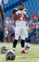 Former NFL player Doug Martin died after struggling with officers while being detained, police say