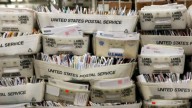 US Postal carrier robbed of packages by masked stranger in Woodbridge
