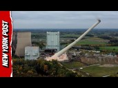 Massive Power Plant Chimney Crashes Down in Demolition