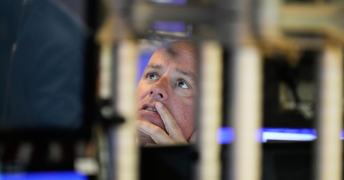 Wall Street's feverish rally takes a break as stocks and gold pull back