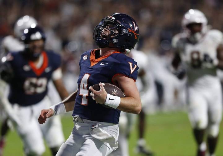 A coach watches his son’s college football dream unfold at Virginia: ‘I’m living and dying on every snap’