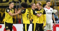 Kobel makes a vital save as Dortmund beats Frankfurt on penalties in German Cup