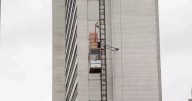 Emergency services scrambled to rescue people stuck in external lift at swanky Manchester city centre hotel
