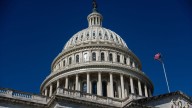 With thousands of jobs gone, defiant Democrats say won't be cowed by Trump