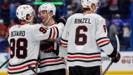 Donato scores 2 more goals as the Blackhawks beat the Lightning 3