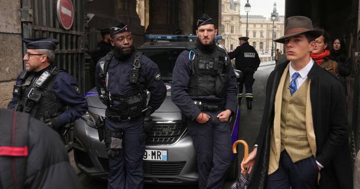 Inspector Clouseau? The mystery man in AP photo after Louvre jewel heist creates a buzz