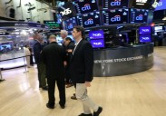 U.S. futures jump and world shares are mixed as Trump says he expects a trade deal with China
