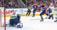 Oilers net first win with 3-1 decision over resilient Canucks