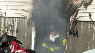 Firefighters, police in Central Islip rescue 2 unconscious women from house fire