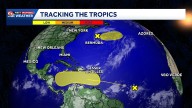 Tracking 2 systems in the tropics. Here's the latest
