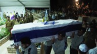 Just-released hostage attends funeral of fellow soldier, whose body was among few returned from Gaza