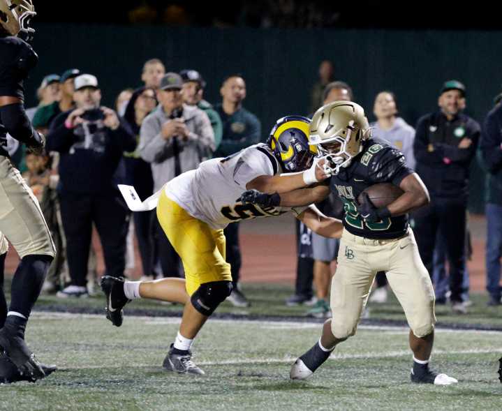 Long Beach Poly football holds off late charge from Millikan