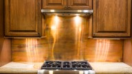 Here's Why You Should Hop On The Copper Backsplash Trend