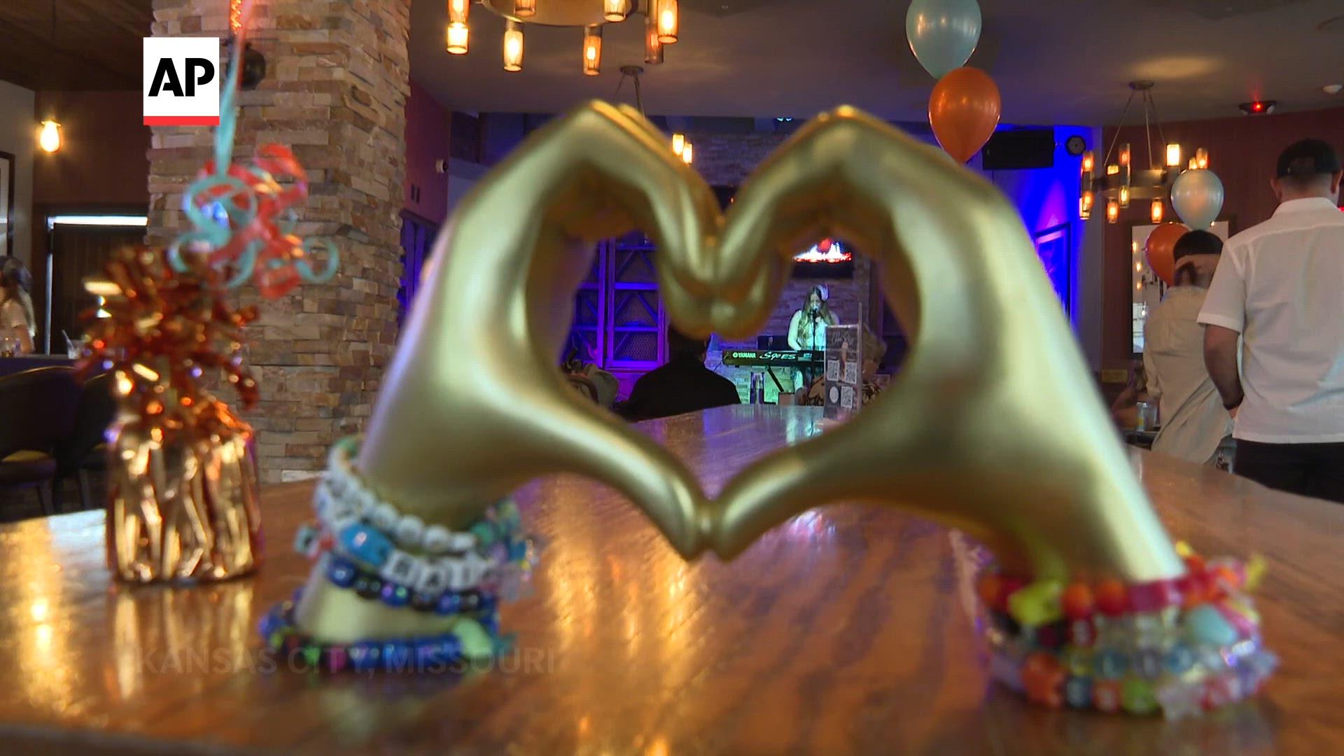 Taylor Swift fans in Kansas City celebrate the release of new album