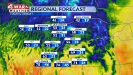 Mountain snow showers diminish as a clear and cold night sets in
