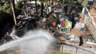 Large Norfolk shed fire damages nearby homes