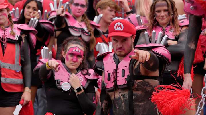 Spray paint, shoulder pads and glitter: The life of a Spike Squad member