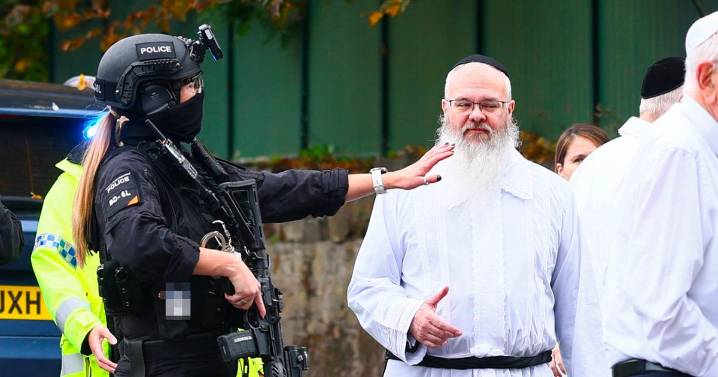 Hero rabbi 'barricaded' synagogue doors to stop rampaging terrorist