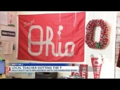 Local teacher dotting the 'I'