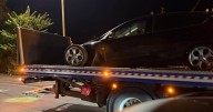 Car smashes into parked vehicle on major Exeter road