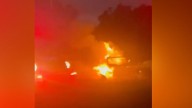Emergency crews rush to scene of fiery crash after car collided with motorbike on West Coast Highway