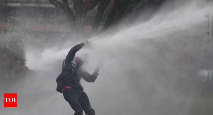 Colombia: Anti-Trump protesters fire arrows at police outside US embassy; four officers injured
