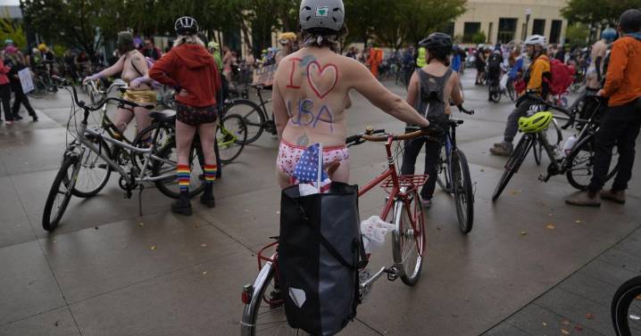 Naked bike riders demonstrate against federal troops in 'quintessentially Portland' protest