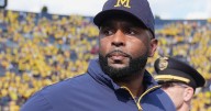 Michigan and coach Moore drop appeal of NCAA penalties