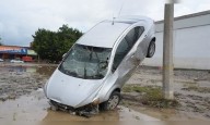 Mexico Floods: See the aftermath of heavy rains sweep away cars, destroy homes, and kill dozens