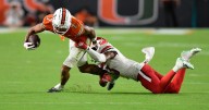 The Latest: Big waves are coming for the top 10 of the AP Top 25