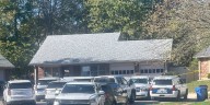Coroner on scene of police investigation at Lexington home