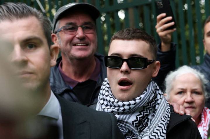 UK prosecutors appeal dismissal of terrorism charge against Kneecap rapper