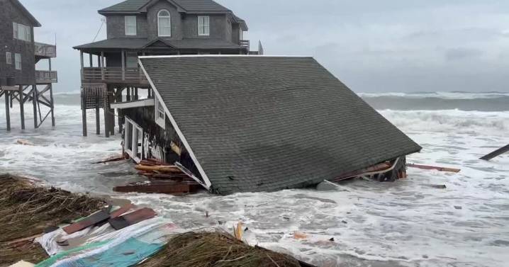 Half a dozen homes in North Carolina's Outer Banks fall into ocean amid rough surf