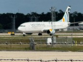 Aircraft slides off runway at RSW; no fire reported