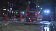 Chicago Water Department Crews repairing water main break on Near North Side, closing traffic on Ohio Street