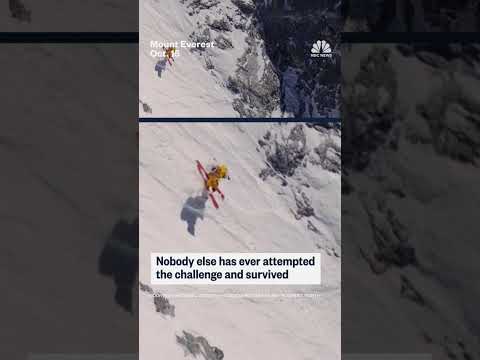 U.S. extreme skier Jim Morrison climbs the North Face of Mount Everest before skiing back down